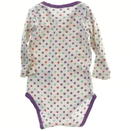 Langærmet bodystocking med stjernemønster (str. 62)