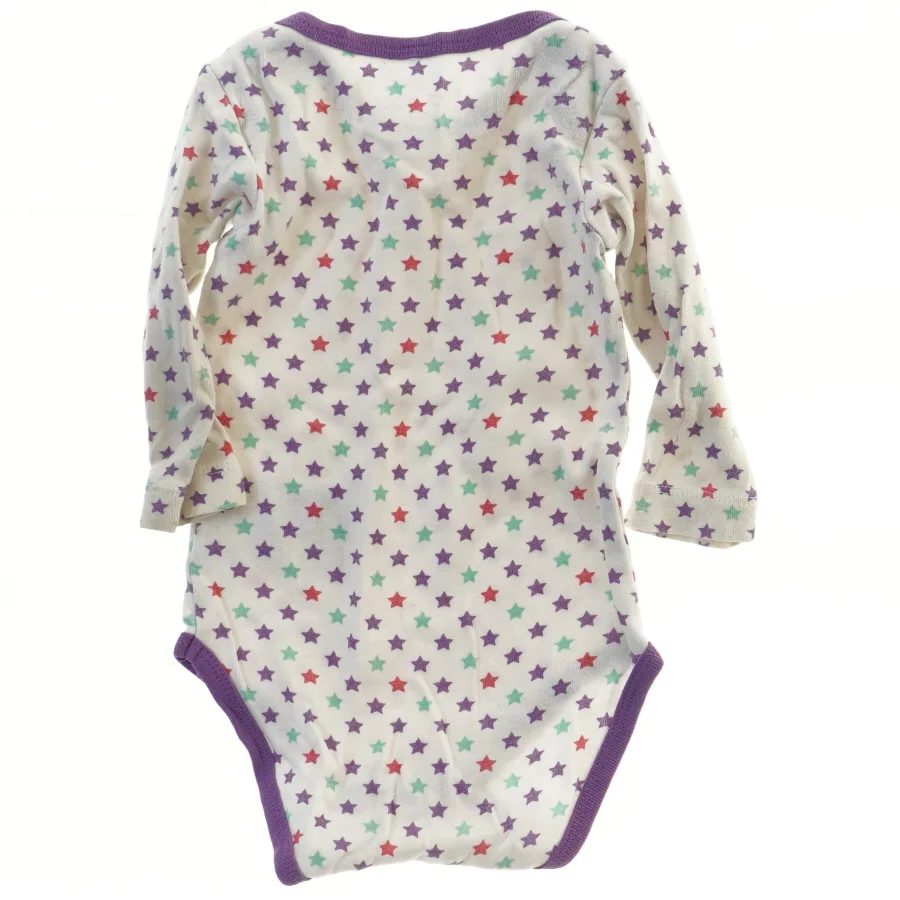 Langærmet bodystocking med stjernemønster (str. 62)