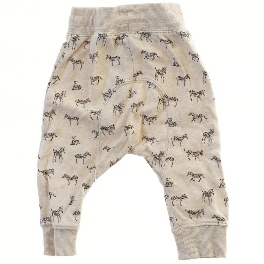 Børnebukser med zebra print fra H&M (str. 74)
