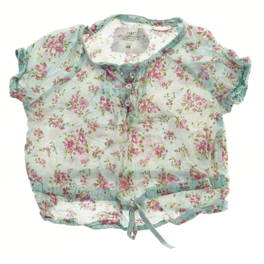 Blomstret kortærmet bluse fra H&M (str. 98)