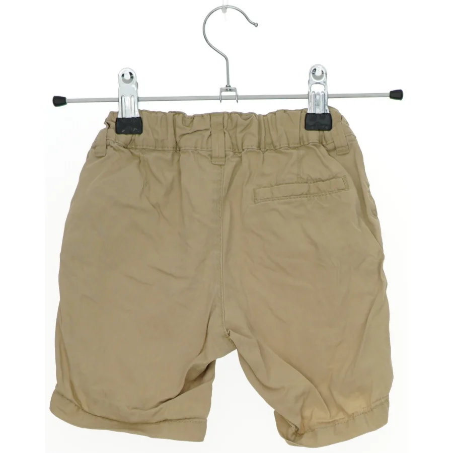 Beige shorts til børn fra H&M (str. 92)